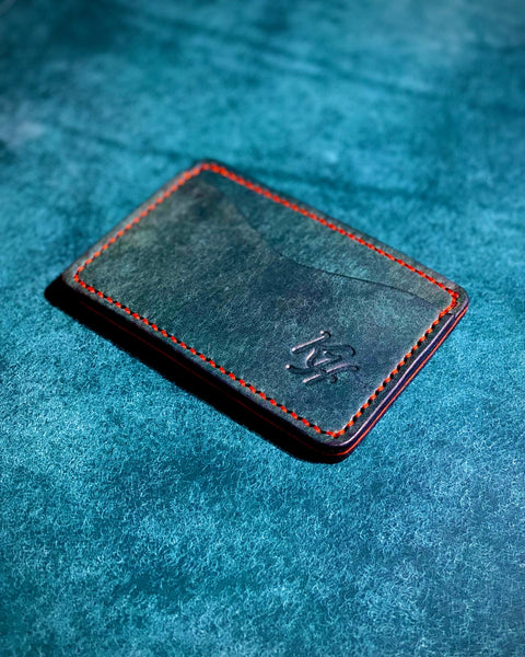 Bulldog Wallet in Petrolio Pueblo Leather with Orange Ghost Leather liner and Vinymo Color 2 Thread